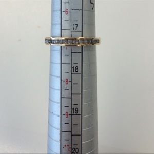 Gold wedding band with diamonds